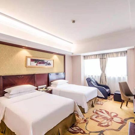 Vienna International Hotel Shanghai Pudong Xiupu Road Esterno foto