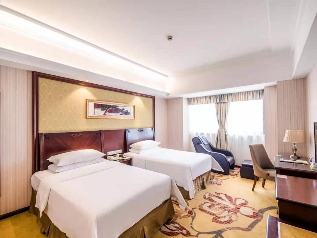 Vienna International Hotel Shanghai Pudong Xiupu Road Esterno foto