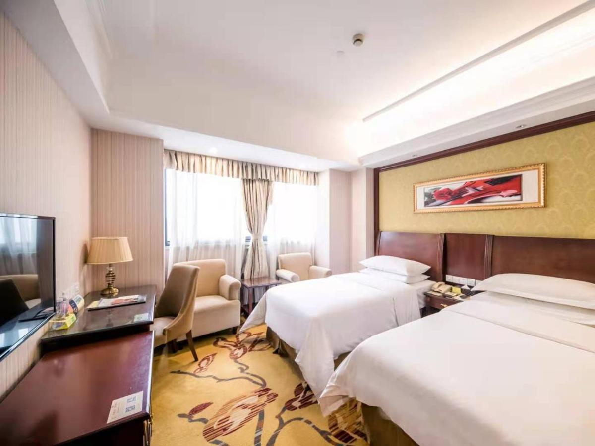 Vienna International Hotel Shanghai Pudong Xiupu Road Esterno foto