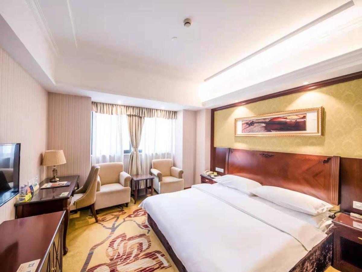 Vienna International Hotel Shanghai Pudong Xiupu Road Esterno foto