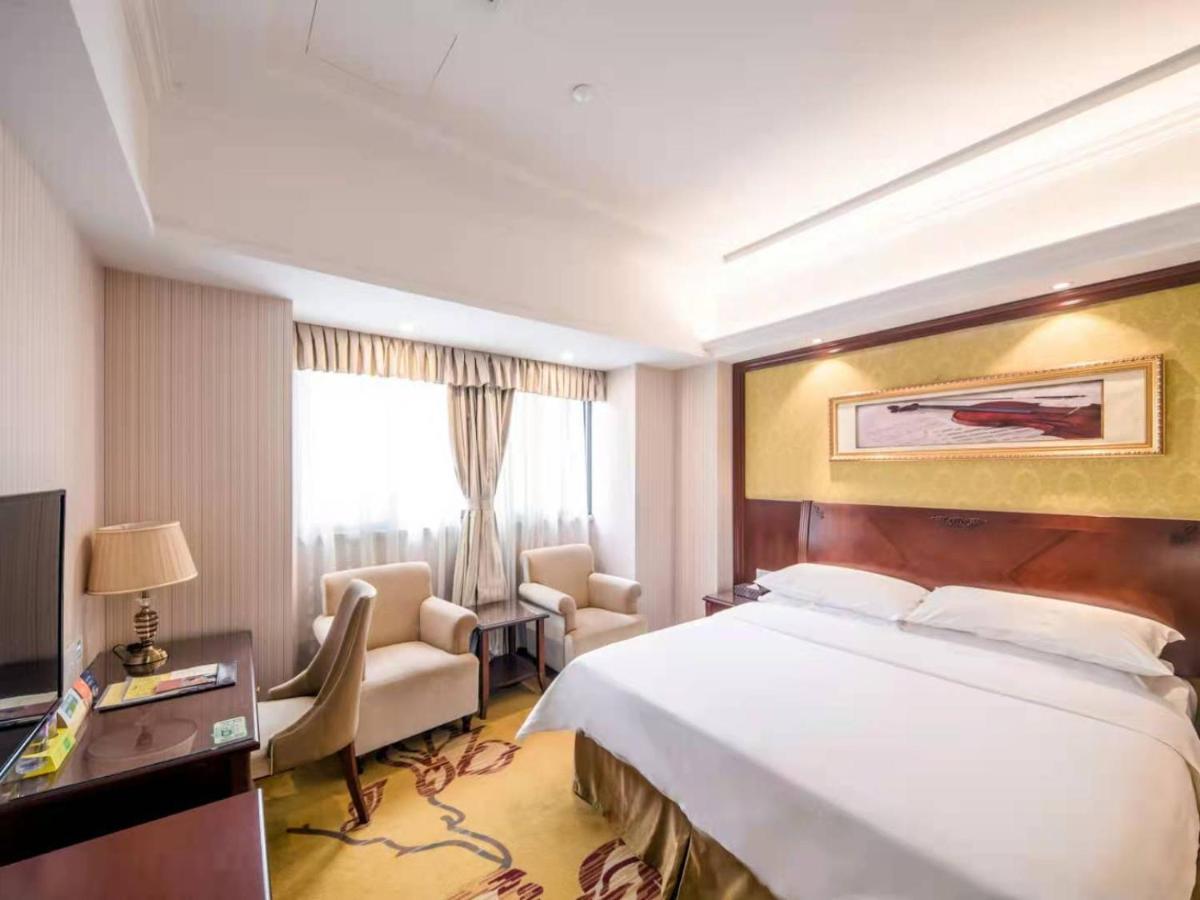 Vienna International Hotel Shanghai Pudong Xiupu Road Esterno foto