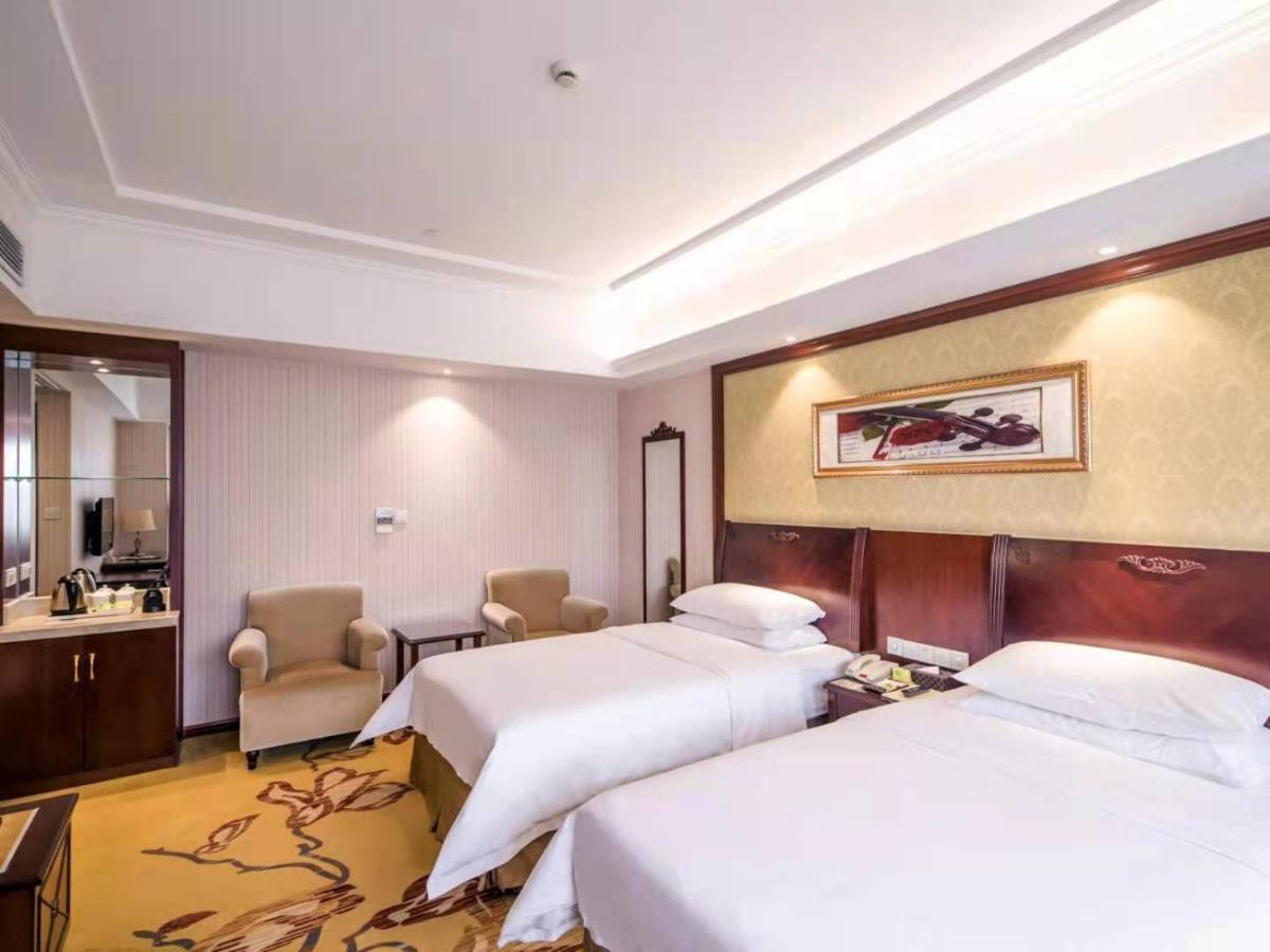 Vienna International Hotel Shanghai Pudong Xiupu Road Esterno foto