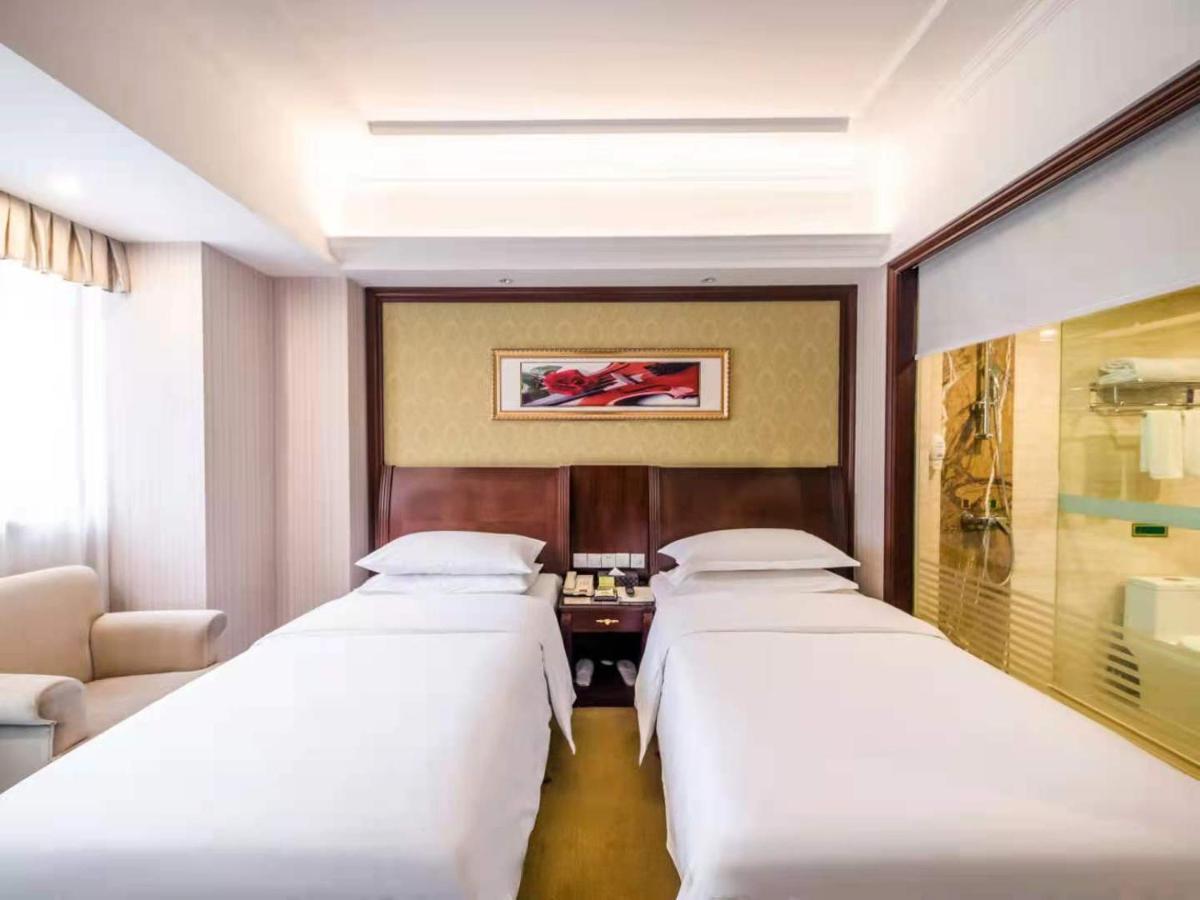 Vienna International Hotel Shanghai Pudong Xiupu Road Esterno foto